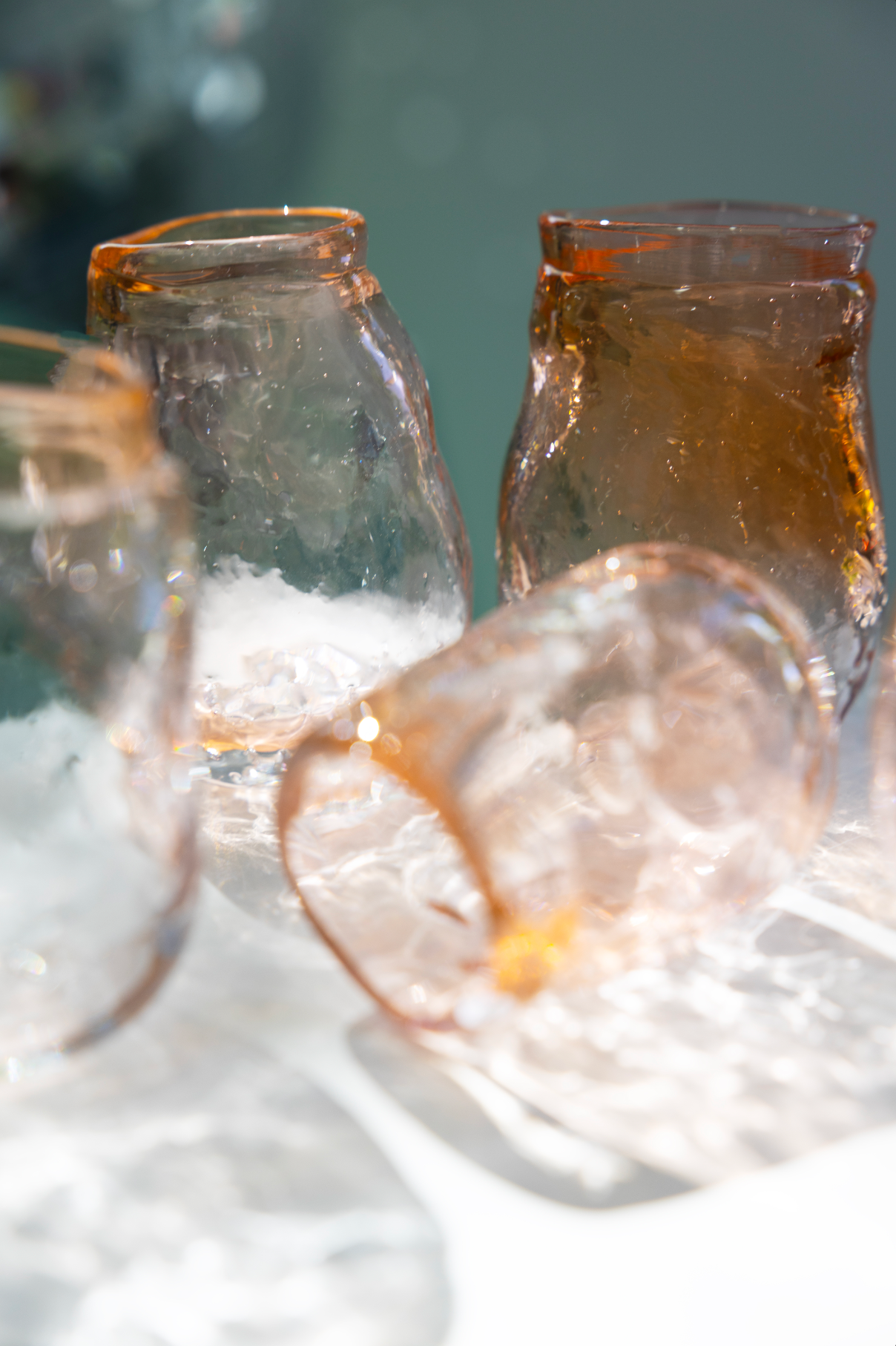 water glass, shades of pink/oranje, by Bernard
