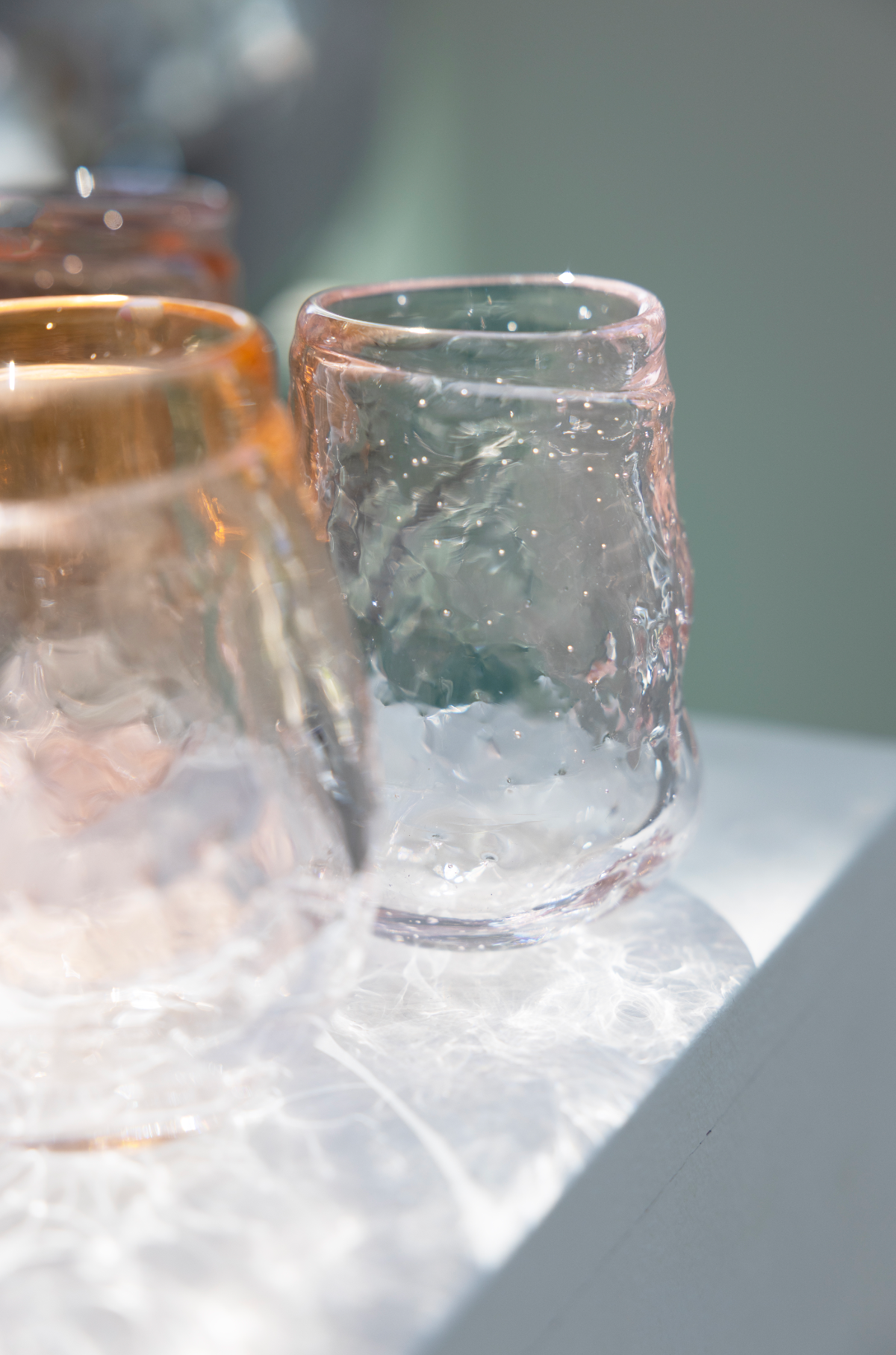 water glass, shades of pink/oranje, by Bernard