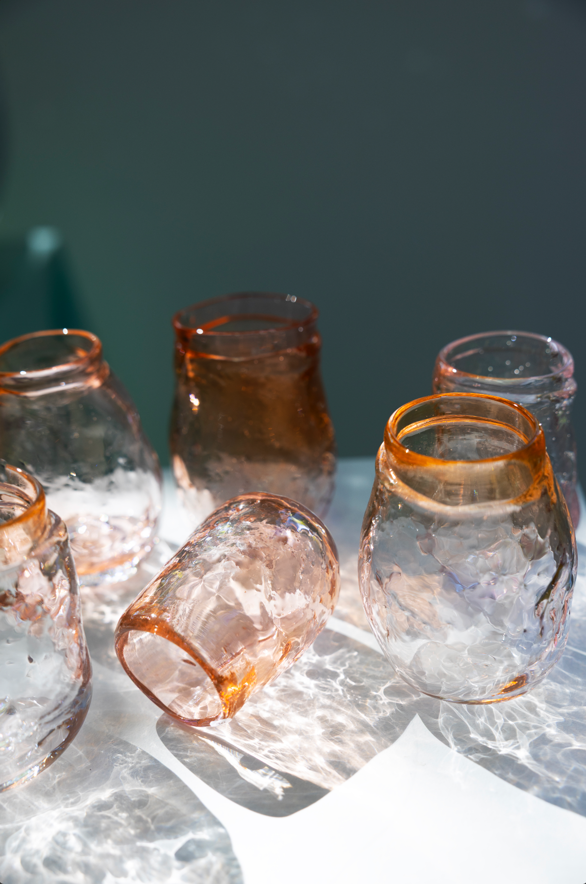 water glass, shades of pink/oranje, by Bernard