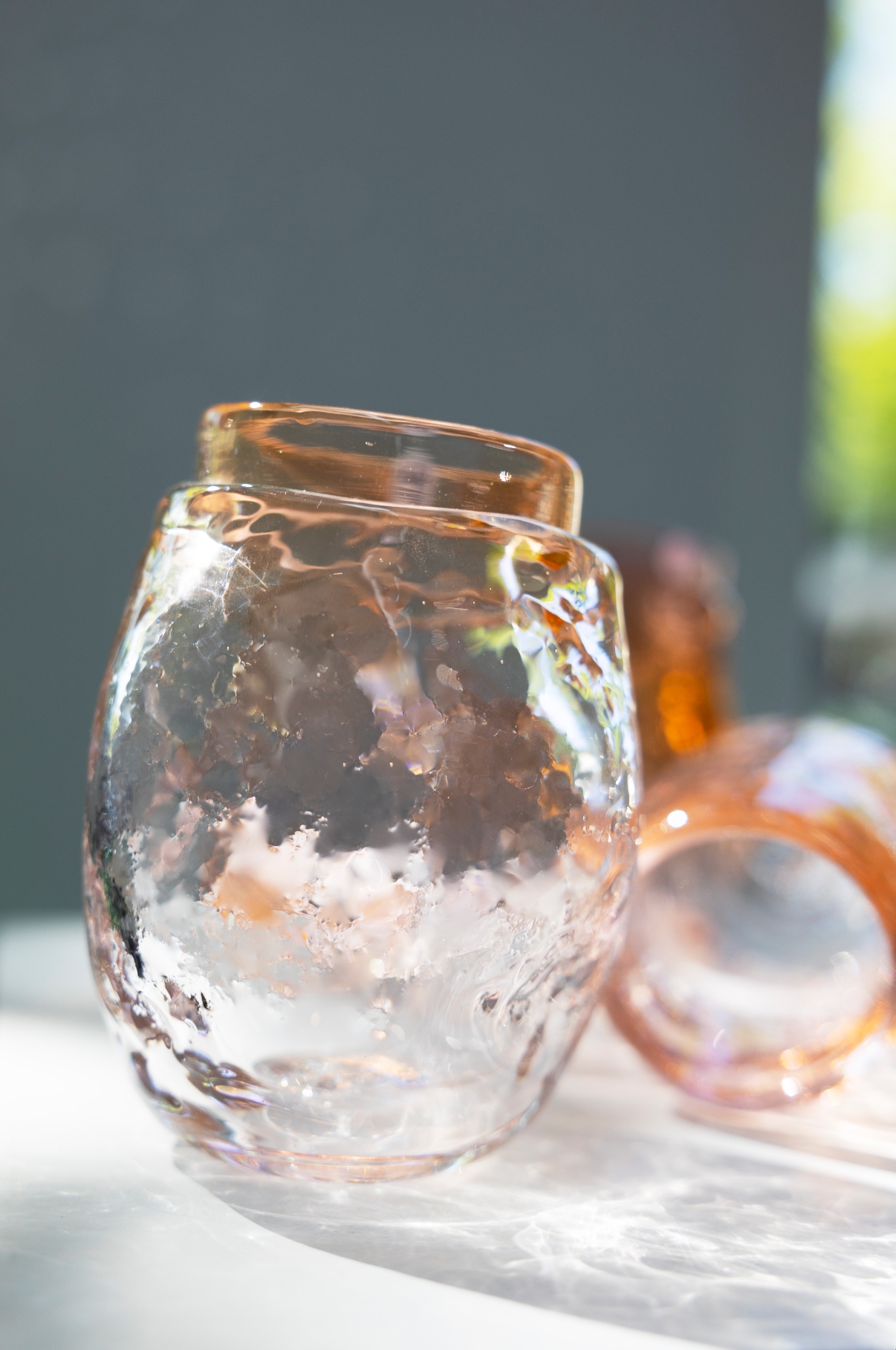 water glass, shades of pink/oranje, by Bernard