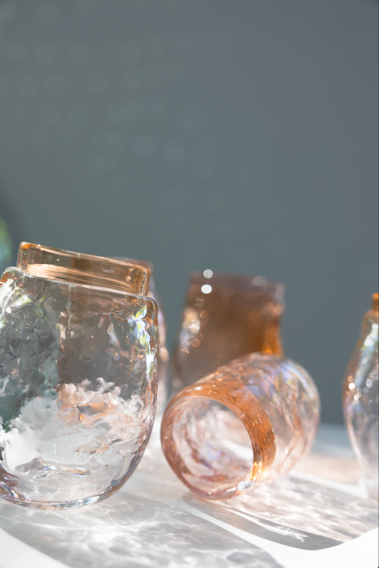 water glass, shades of pink/oranje, by Bernard