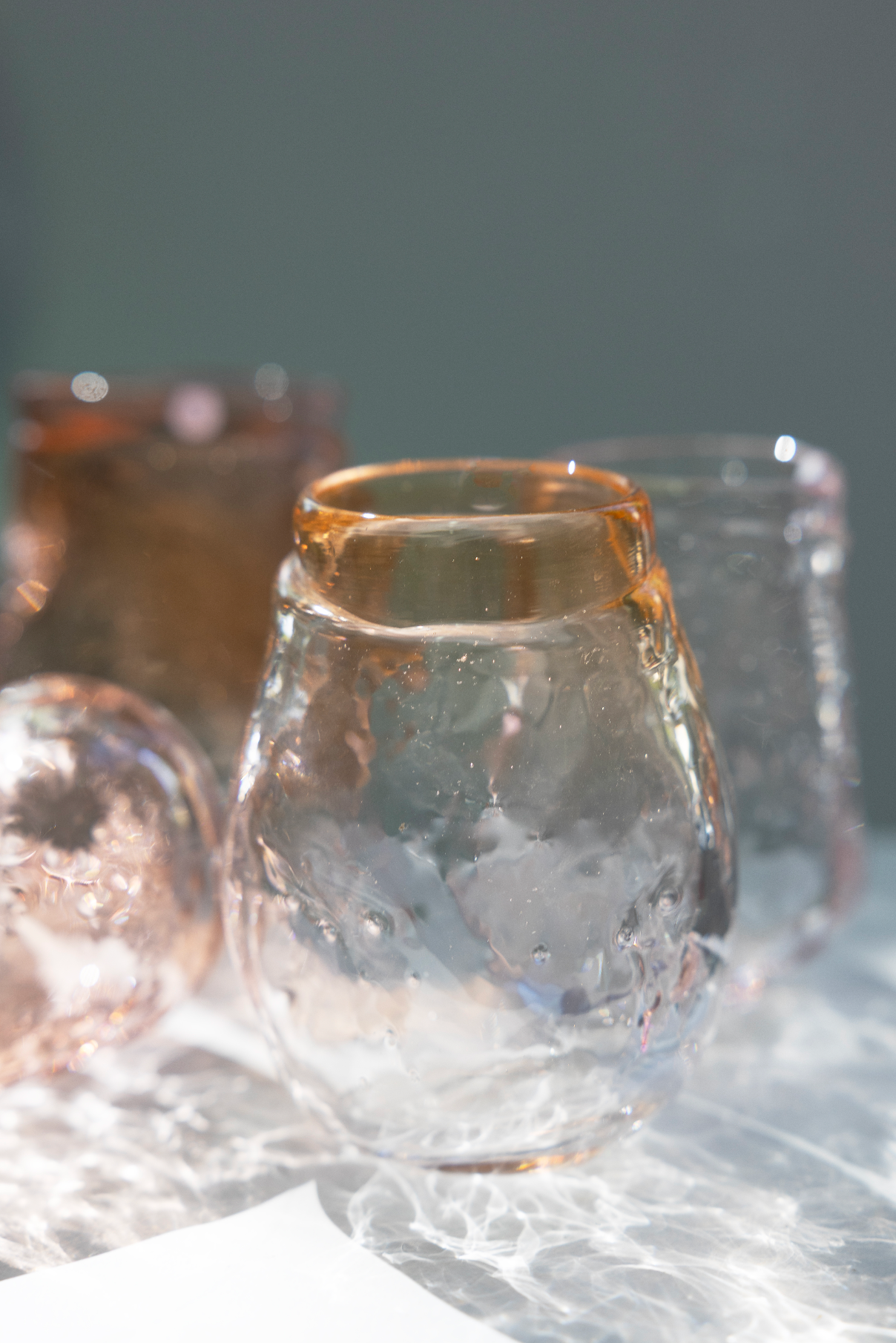 water glass, shades of pink/oranje, by Bernard